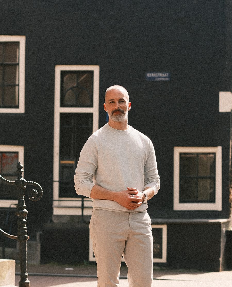 Michel Guerreiro, coach, standing on a street in Amsterdam